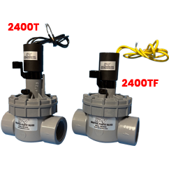 Two gray valve assemblies with black solenoids and wired cables, each labeled 2400TF in red (paired setup).